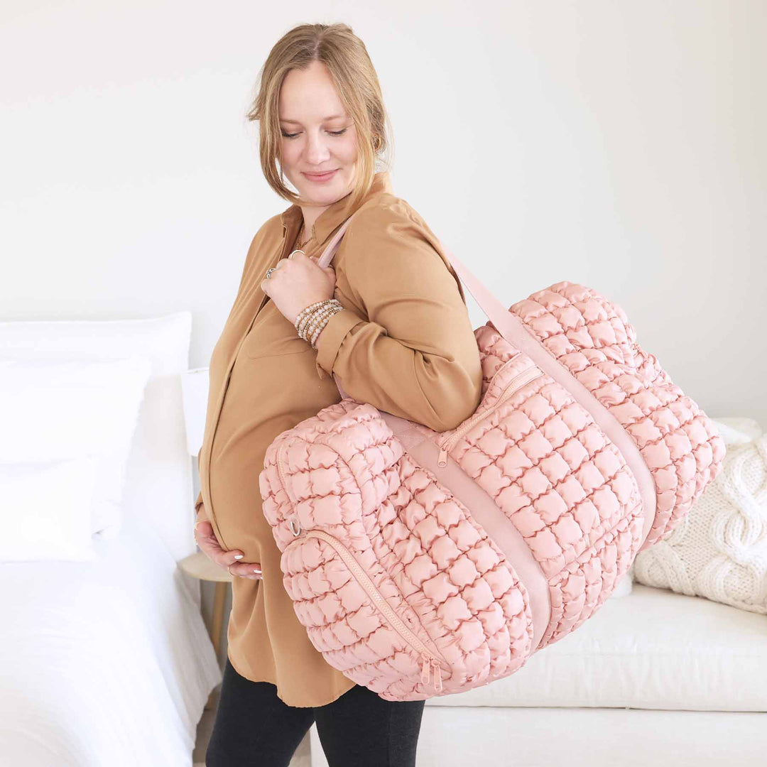 pink quilted weekender bag for women