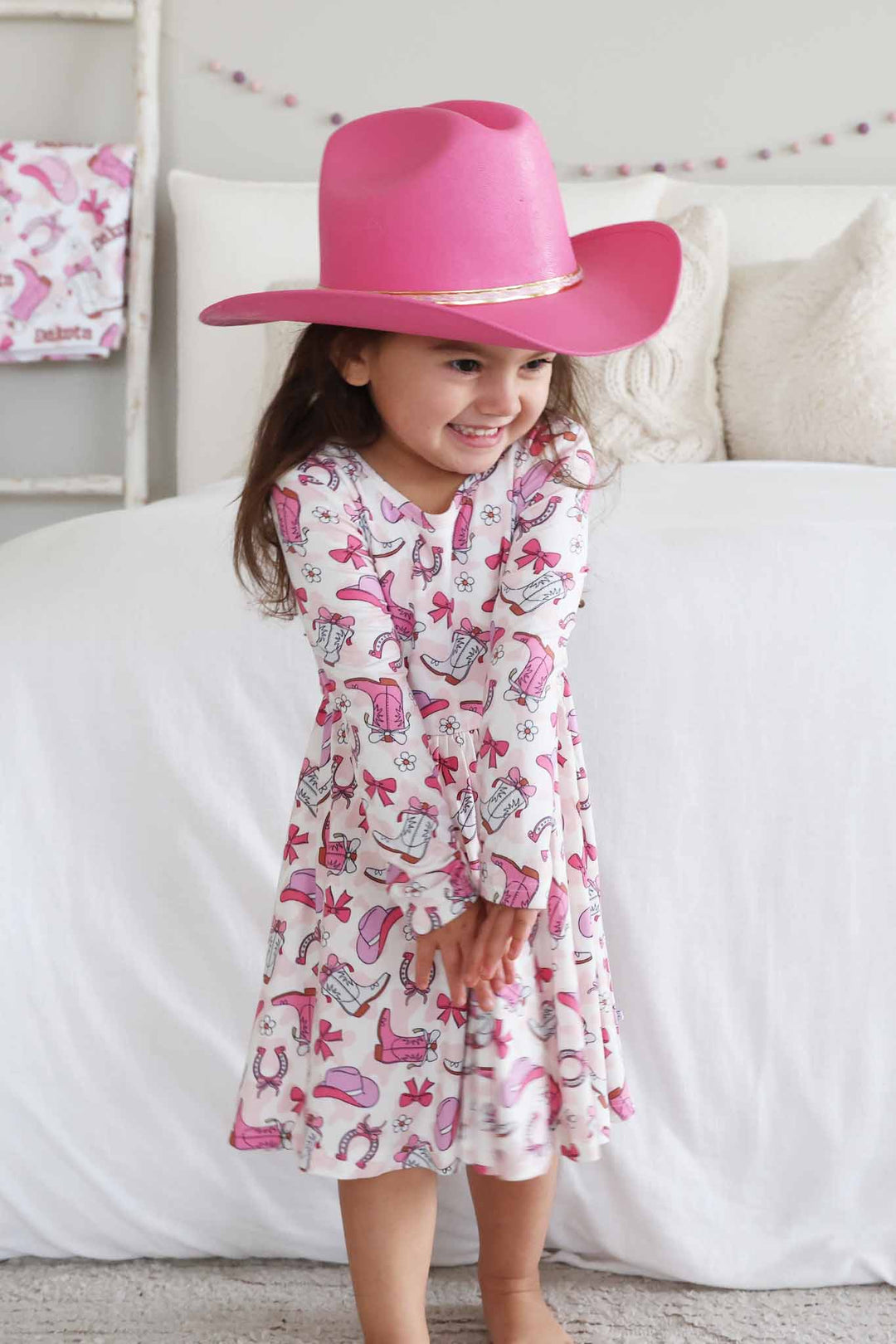 pink rodeo dreams twirl dress with matching pink cowgirl hat 