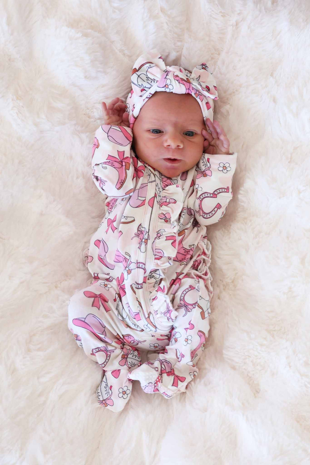 pink cowgirl themed bamboo viscose ruffle zipper footie for girls 