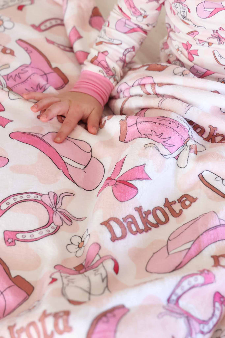 pink cowboy hat, horseshoe, boots and bow personalized rodeo blanket for girls 