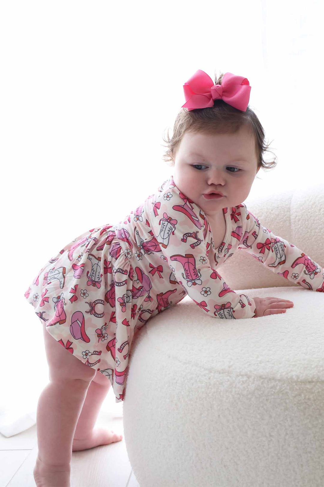 rodeo dreams long sleeve bodysuit with hot pink ribbon bow