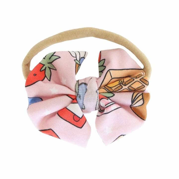 pink pancake themed knit bow headband for girls 