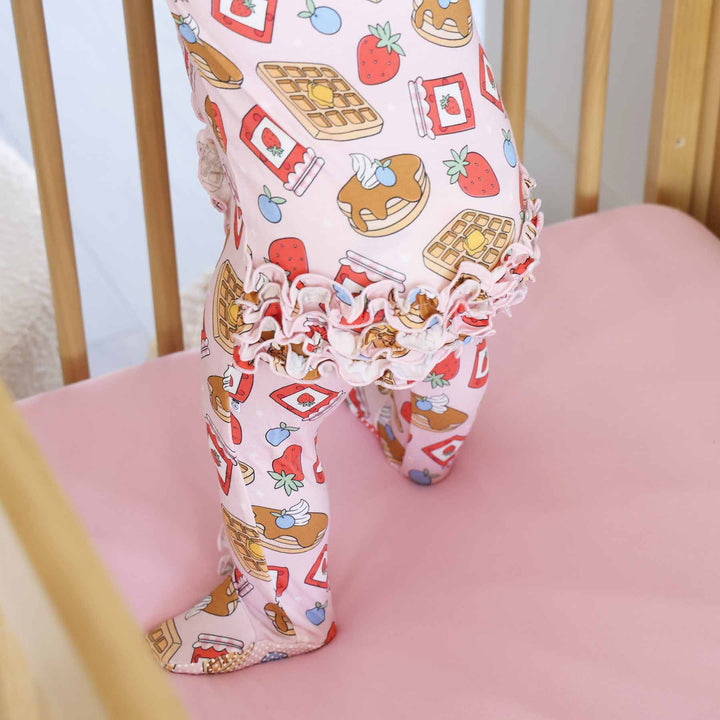 pink sweet stacks ruffle bottom zipper footie for newborn and baby girls 