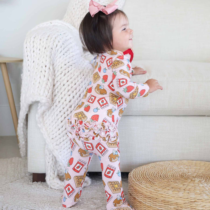 sweet stacks pink ruffle bottom zipper footie for girls 