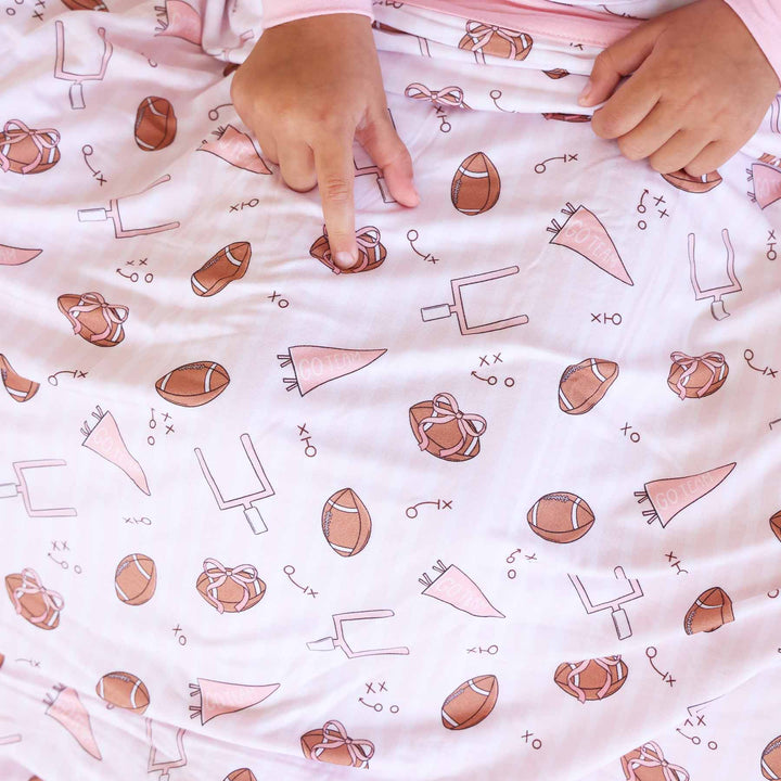 girly pink football blanket made of bamboo