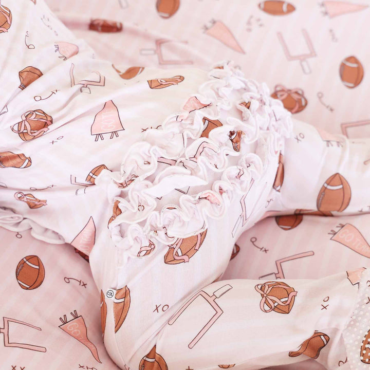 girl football ruffle bottom zipper footie for babies 