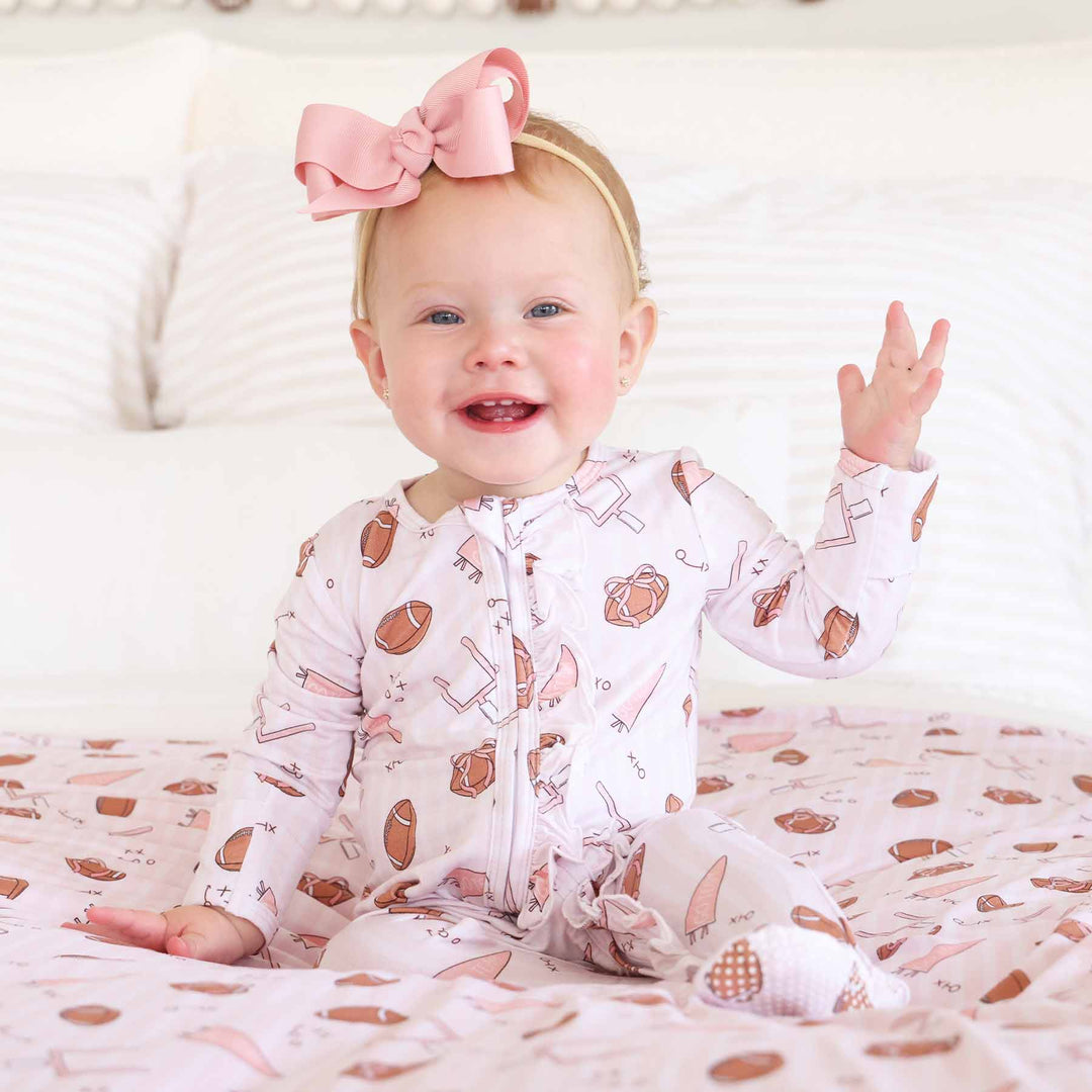pink tiny touchdowns ruffle zipper footie pajama for girls 