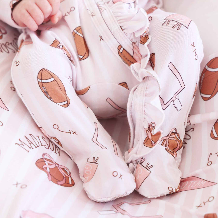 girl ruffle zipper footie football themed 