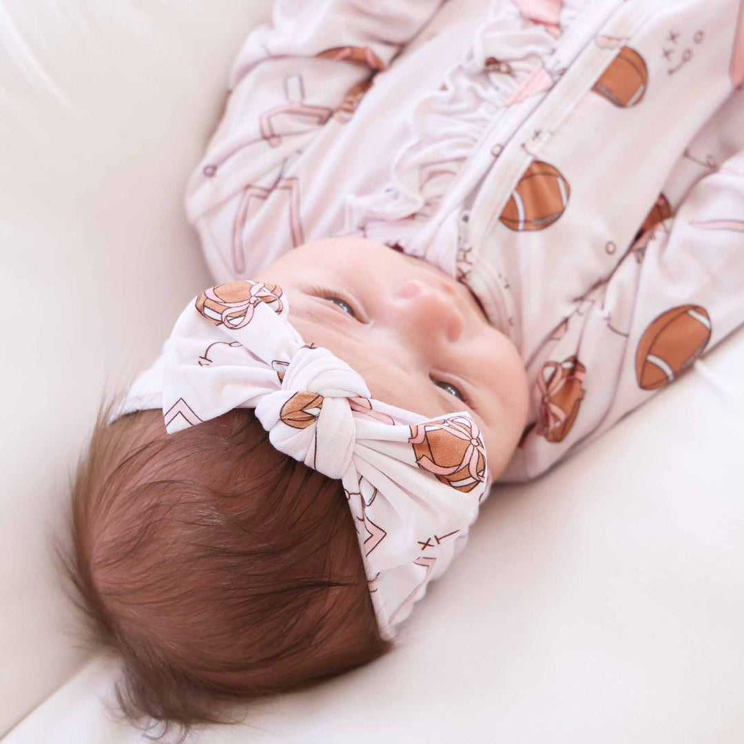 pink tiny touchdowns knit large bow headwrap for babies 