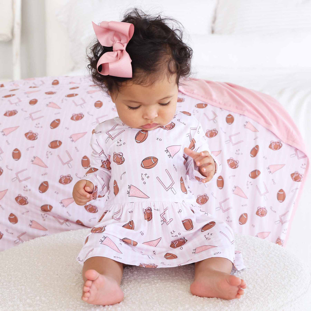 long sleeve pink football skirt bodysuit for girls 