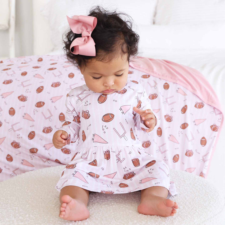 long sleeve pink football skirt bodysuit for girls 