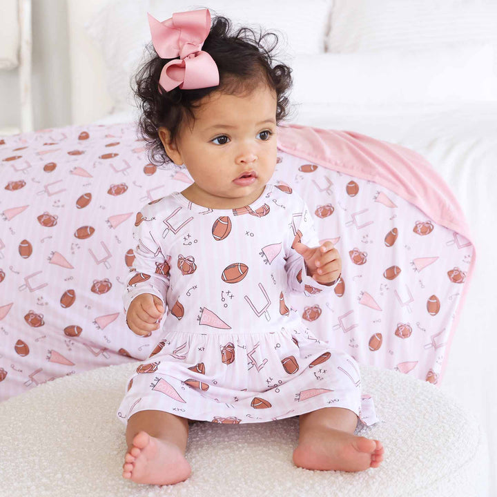 pink tiny touchdowns long sleeve skirt bodysuit for baby and toddler girls 