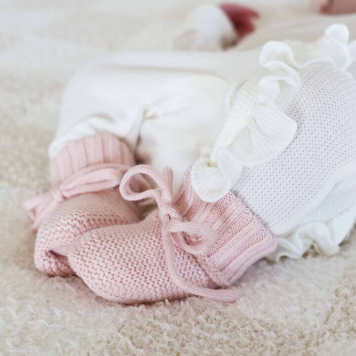 pink baby booties with bow