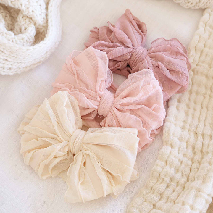 large ruffle knit bow pinks 