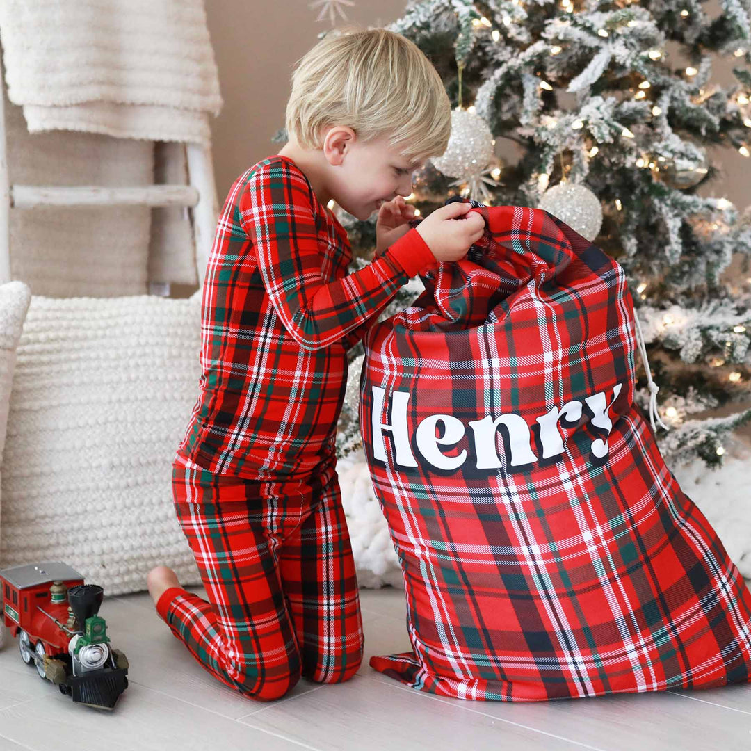 red and green plaid personalized santa sack for kids 