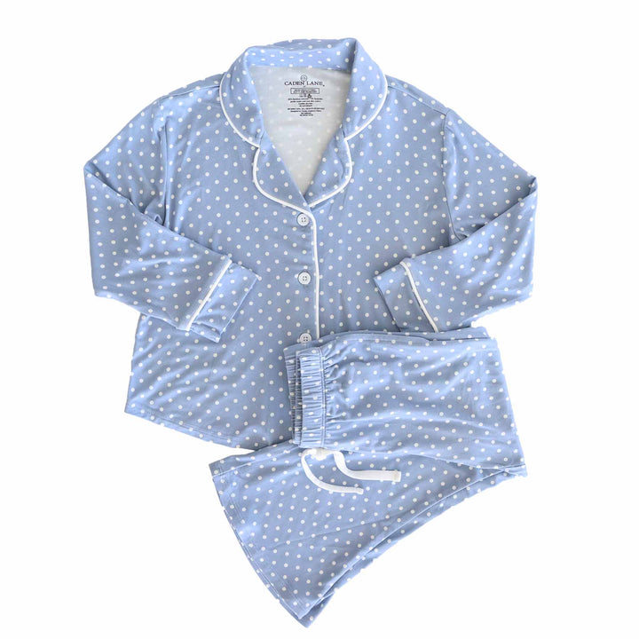 long sleeve lounge set for girls with a button up shirt with a collar and flare pants with a drawstring. dusty blue with white polka dot print.