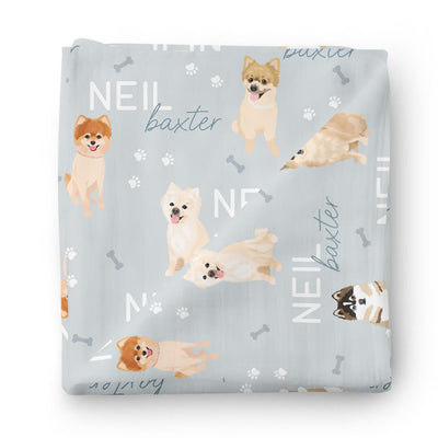 personalized baby name swaddle blanket blue with pomeranians