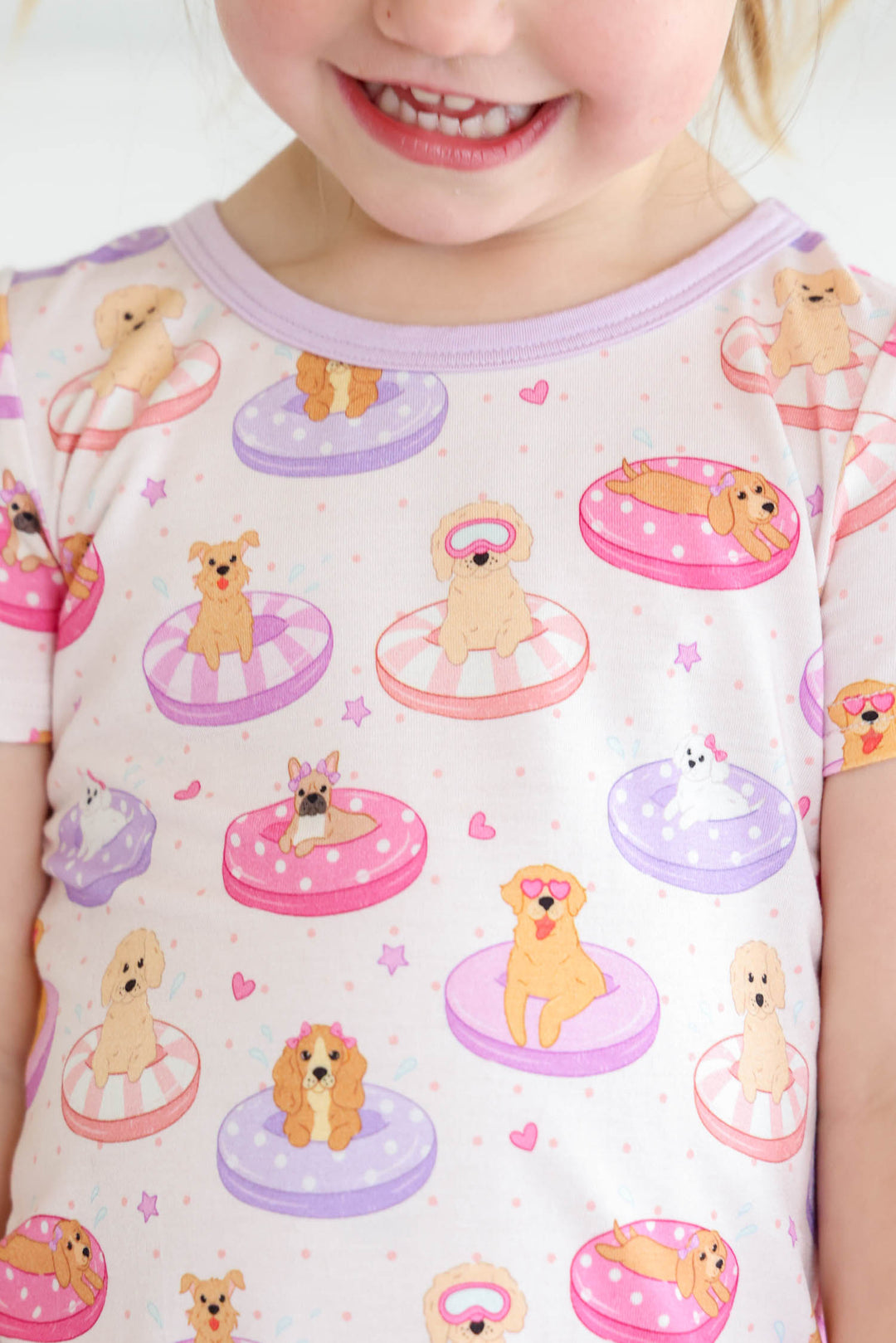 closeup of poolside pups two piece pajama set