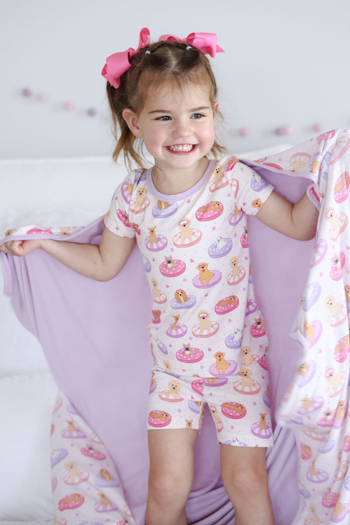 two piece short pajama set with matching bamboo blanket in poolside pups pink