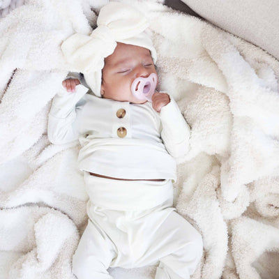 white newborn outfit made of bamboo 
