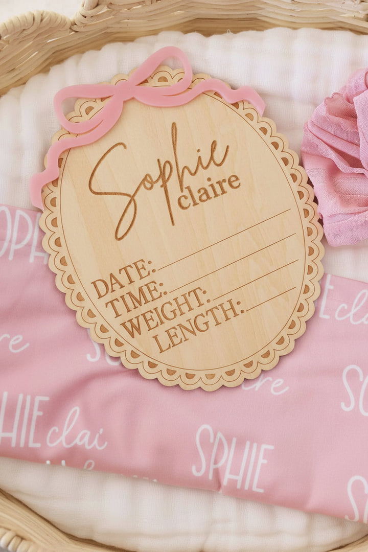 newborn birth stats name sign with pink box on top and scalloped edges 
