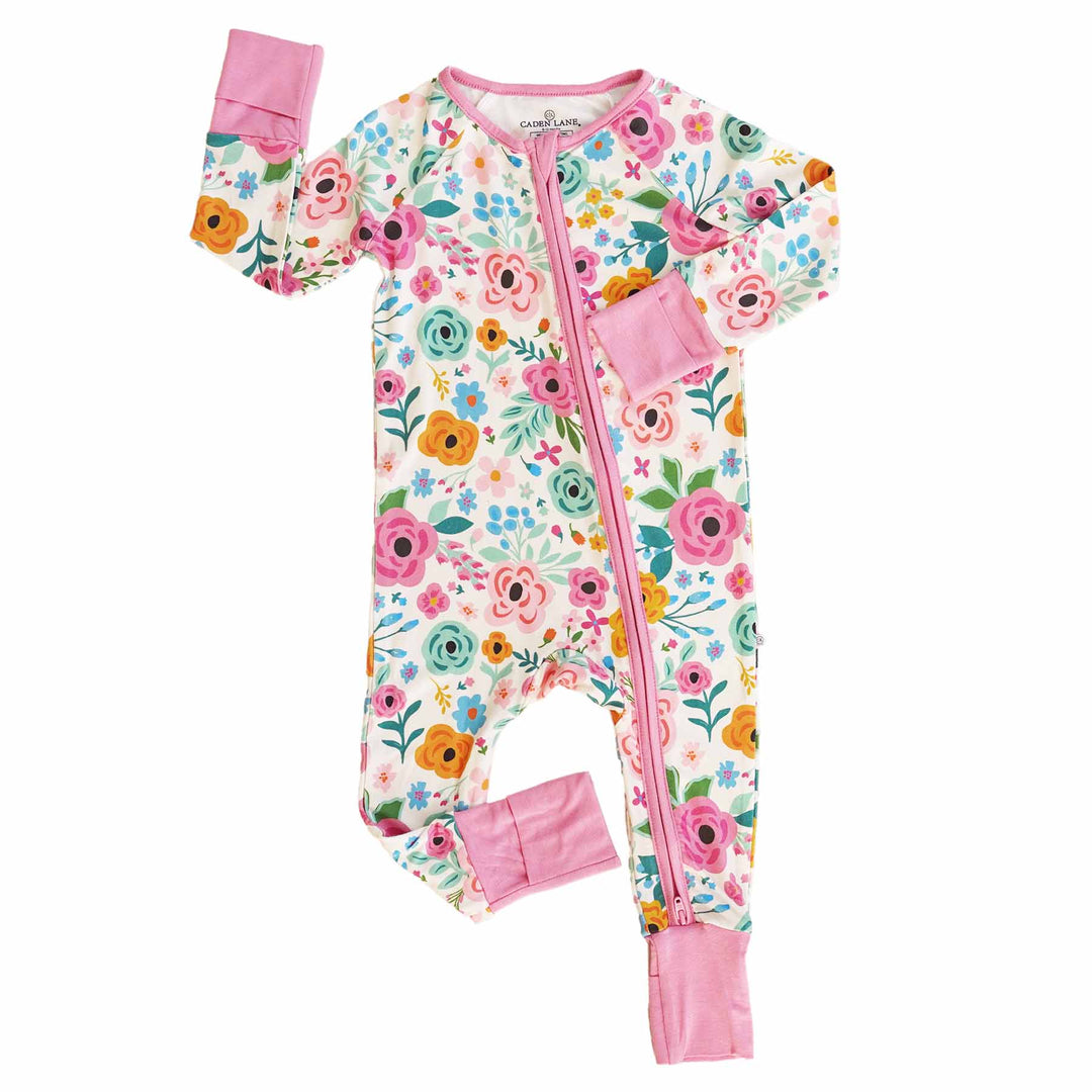 pink, green and yellow zip romper for babies 