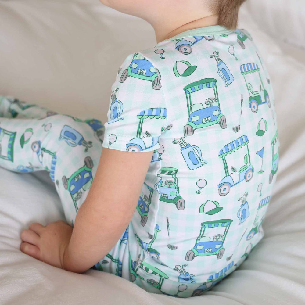 golf themed two piece pajama set for boys blue and green
