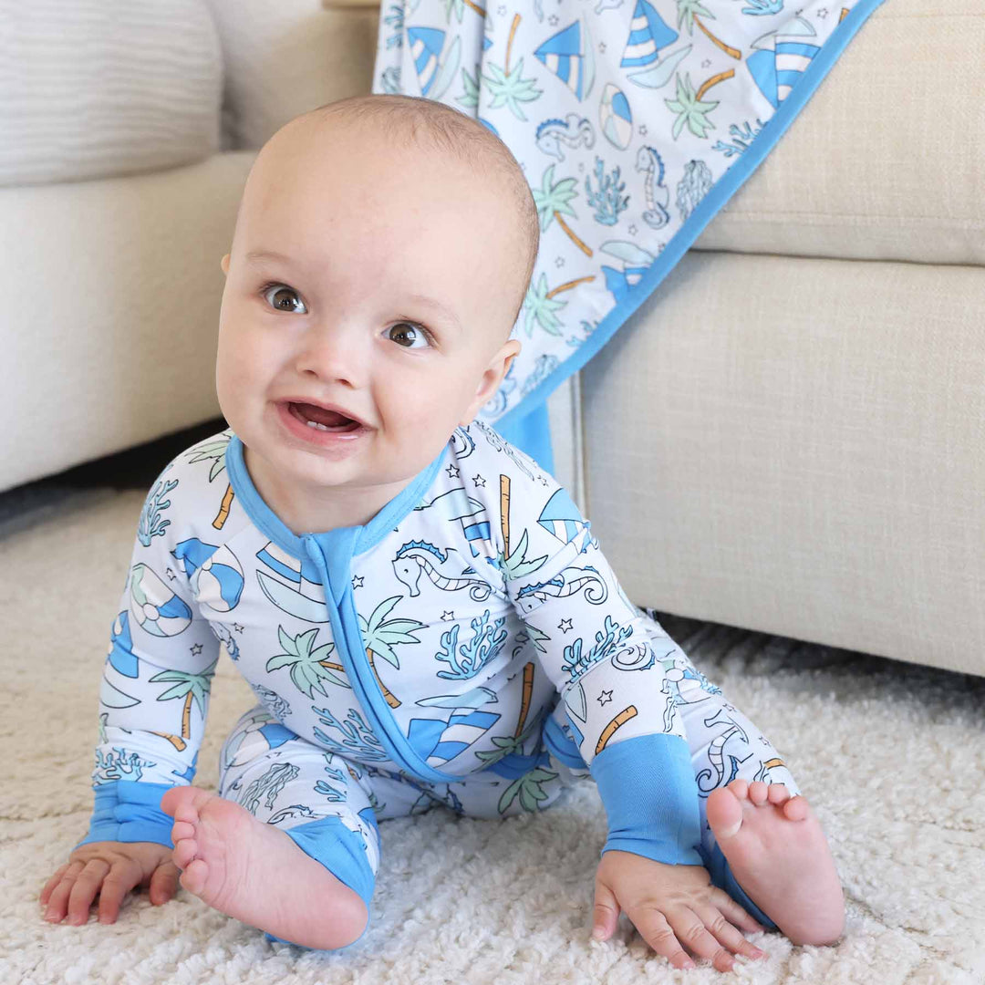 blue beach themed zip romper pajama for boys