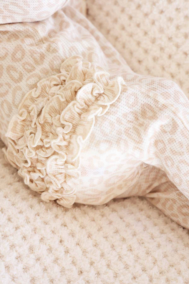 NEUTRAL LEOPARD RUFFLE FOOTIE VIDEO