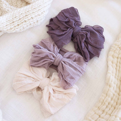 large ruffle knit bow purples 