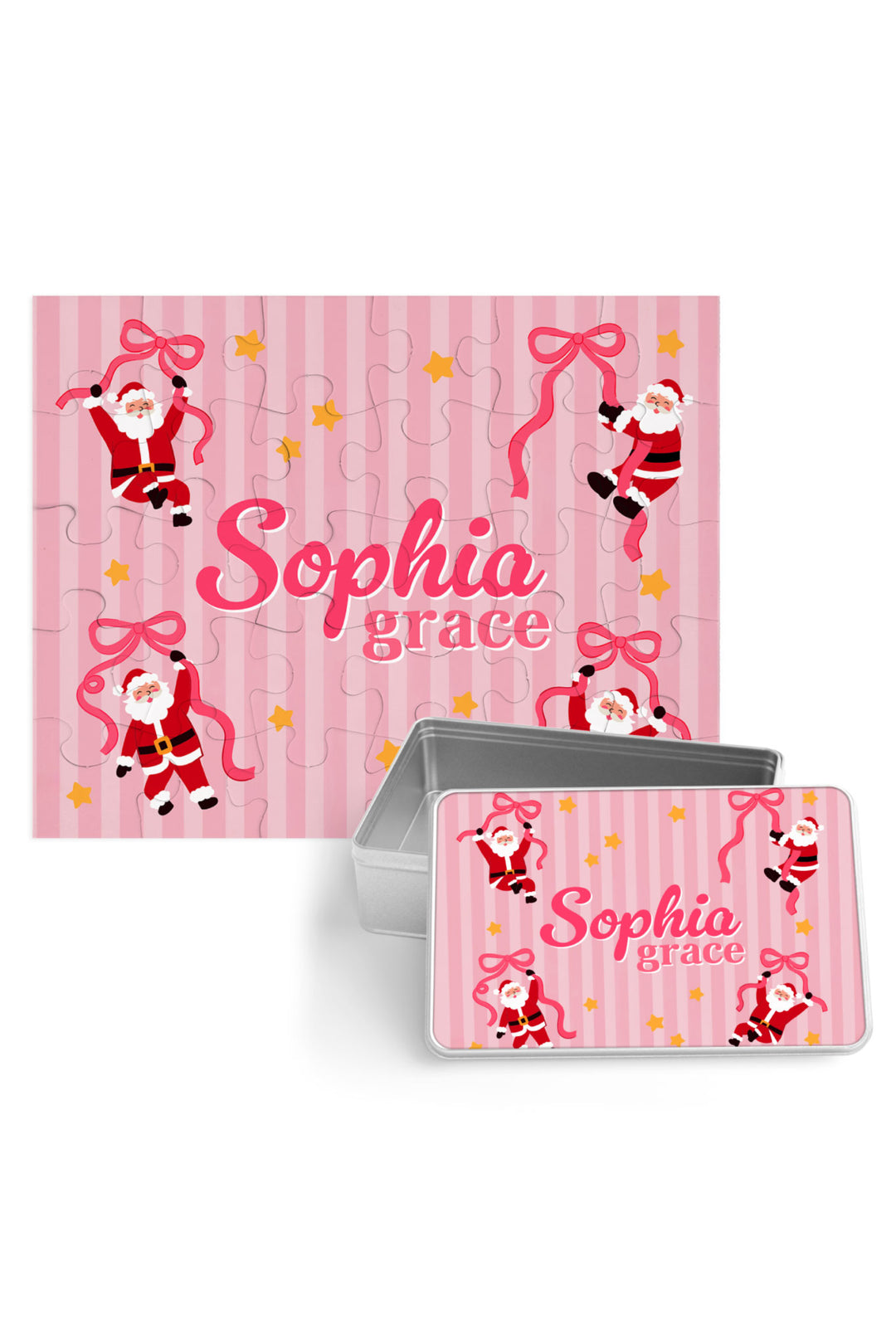 Personalized Caden Lane Christmas 30-piece puzzle with matching metal keepsake storage tin in the Jolly Ribbons print, featuring a custom name and festive Santa ribbon design.