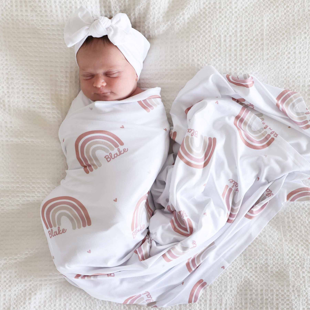 muted rainbow personalized swaddle blanket for girls