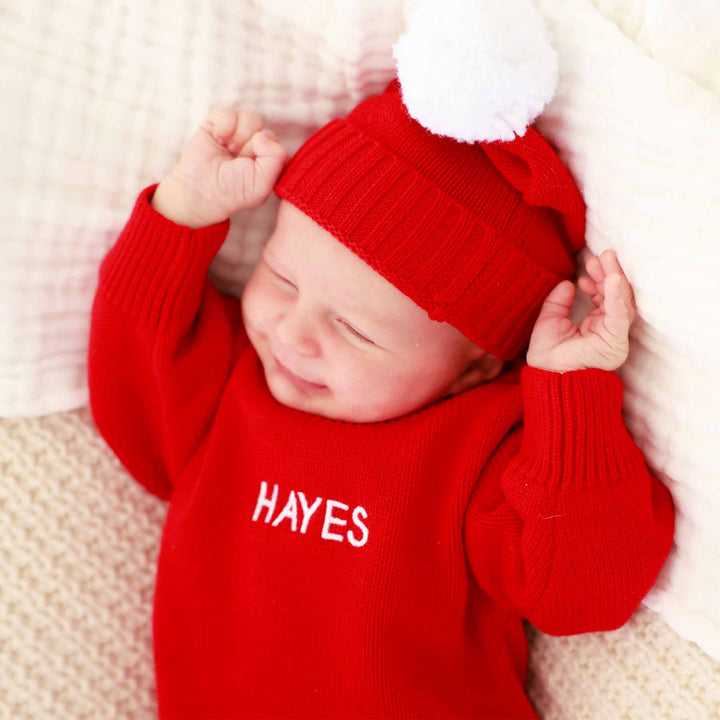 red personalized knit sweater bubble romper for babies with matching pom pom beanie 
