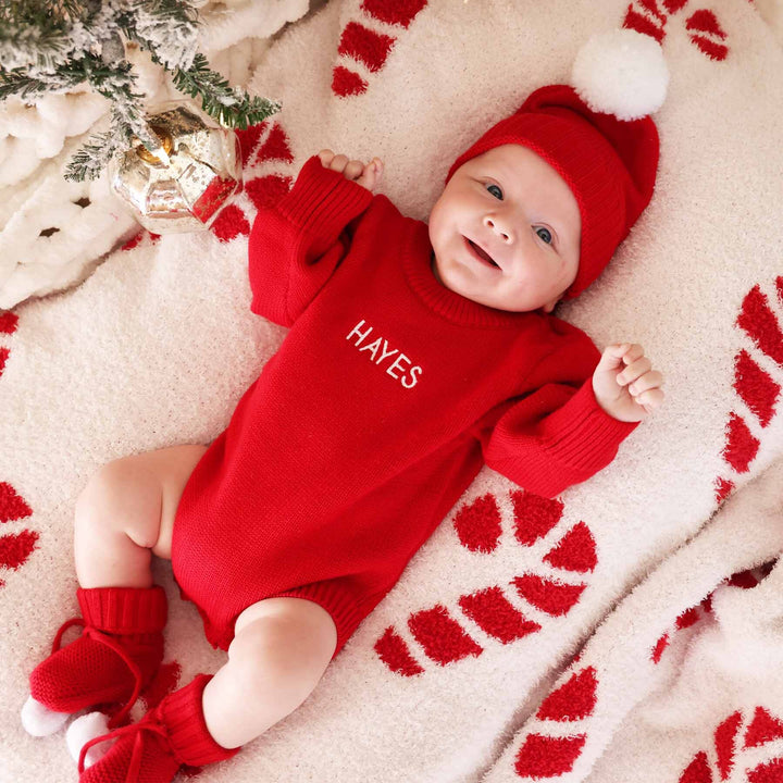 embroidered bright red christmas sweater bubble romper for babies gender neutral with block font 
