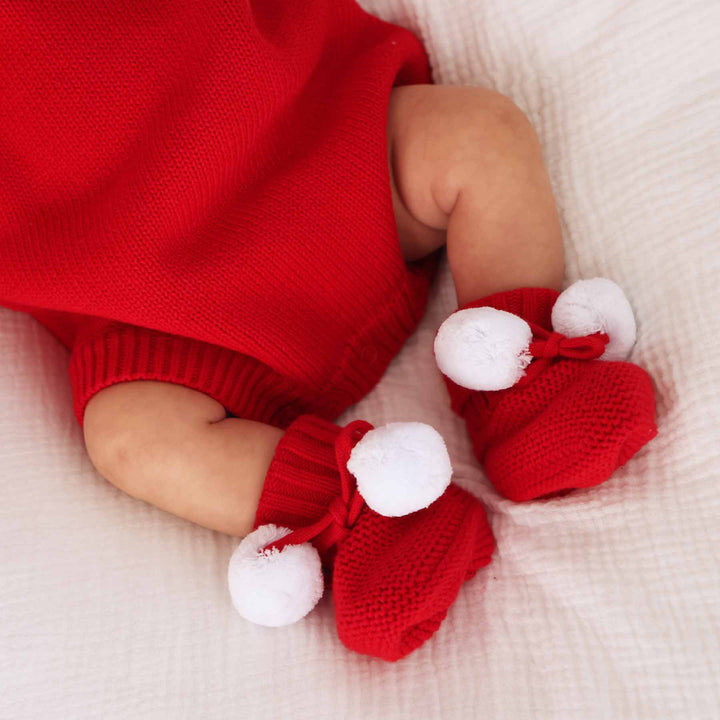 bright red sweater booties for babies with pom poms 