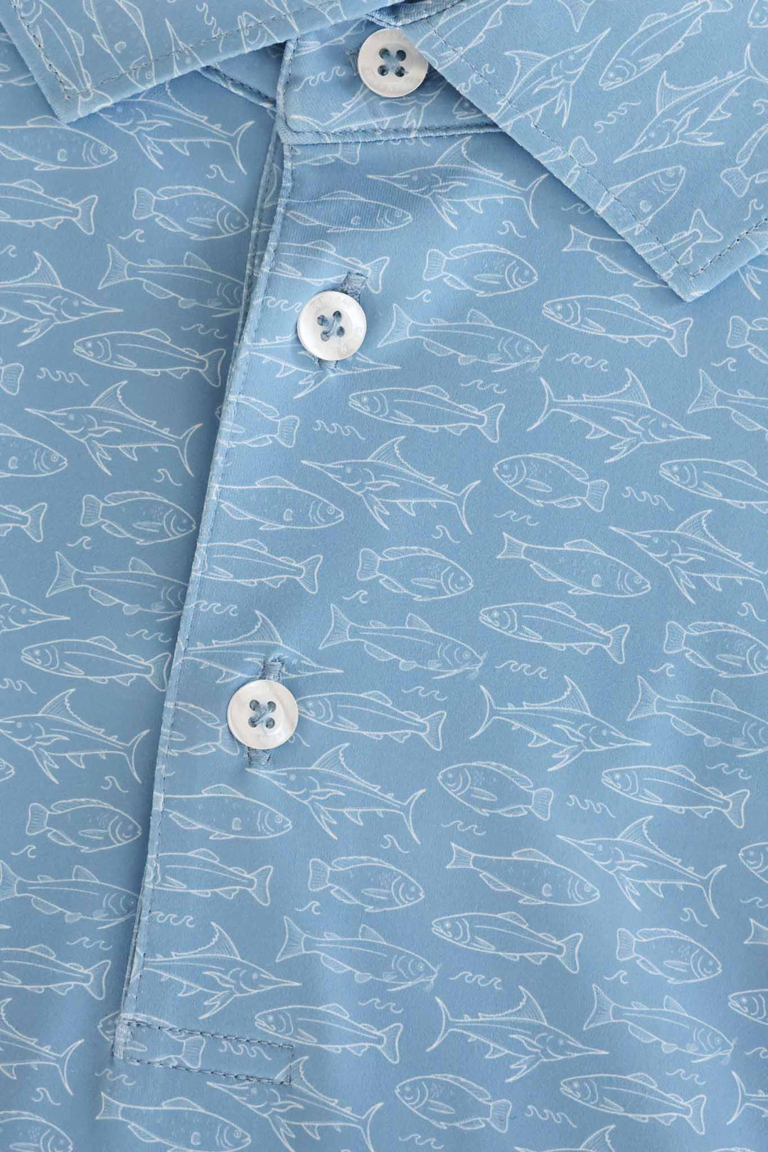 closeup of reel legends golf shirt for father and son  matching 