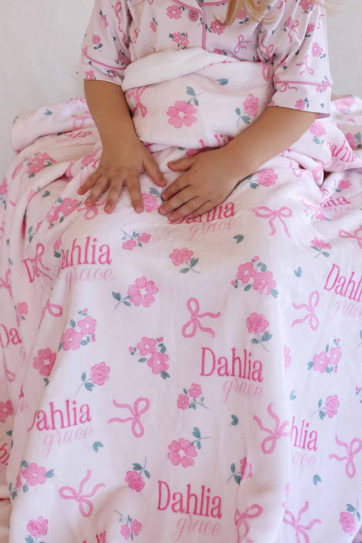 pink personalized blanket for girls in ribbon and roses print with matching short sleeve flare lounge set 