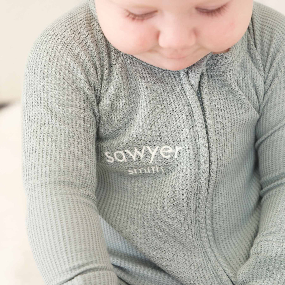 light green convertible zip romper pajama for babies and toddlers gender neutral