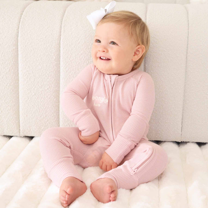 light pink zip romper pajama embroidered with name lotus caden lane 