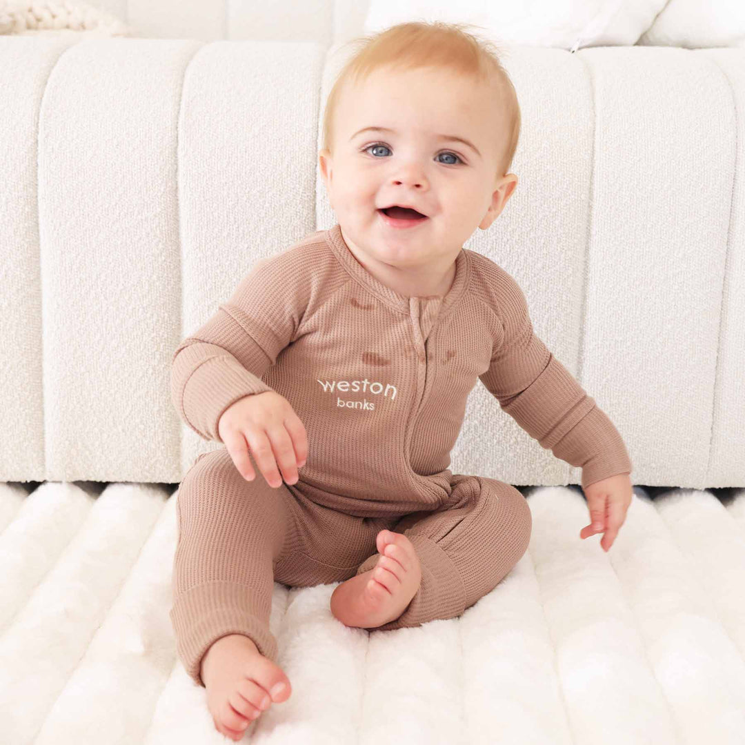light brown bamboo waffle convertible zip romper pajama for babies and toddlers 