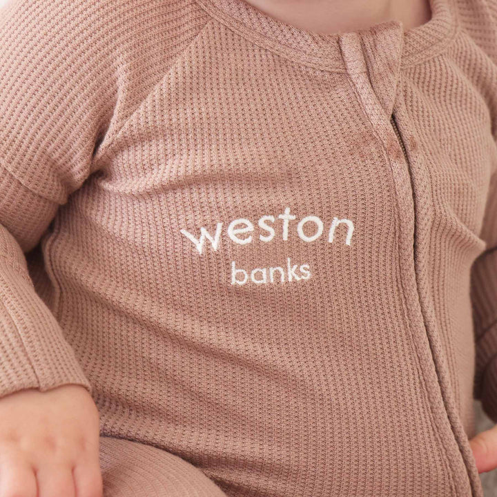 baby zipper romper embroidered with name neutral brown