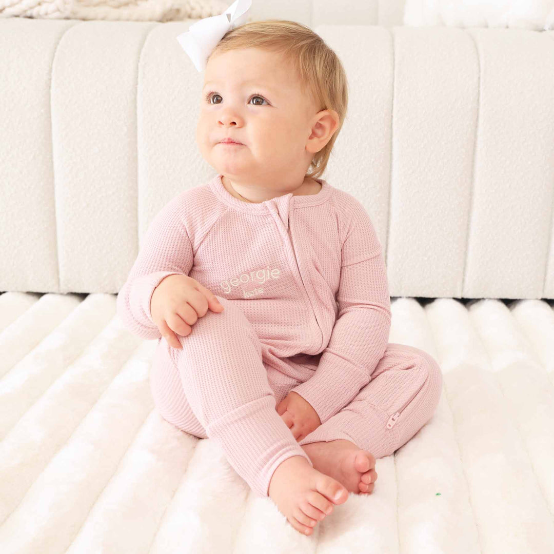 convertible zip romper pajama for babies and toddler light pink embroidered with first and middle name 