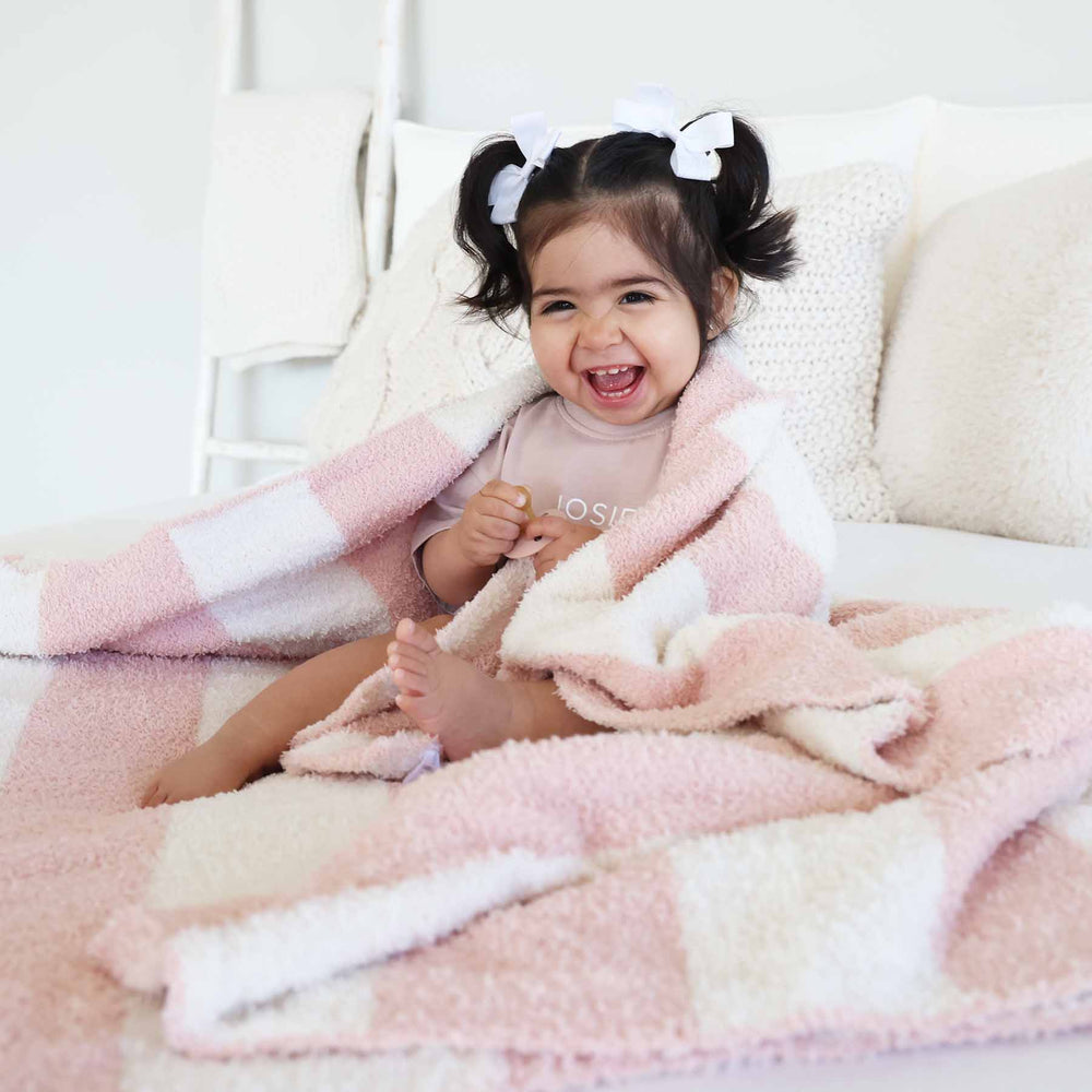 pink and white plush microfiber blanket for babies, toddlers and kids 