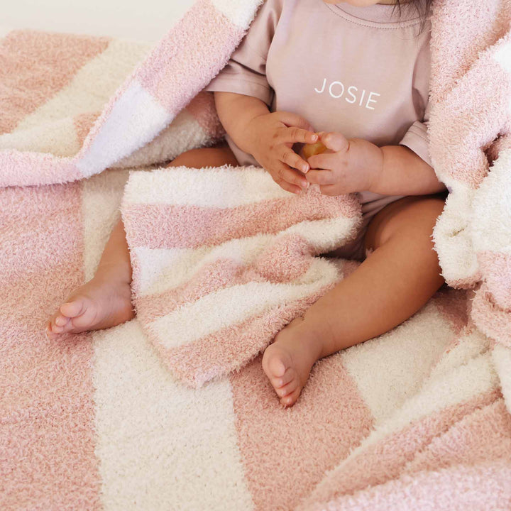 pink and and white stripe cuddlelane luxe blanket and matching lovey for babies 