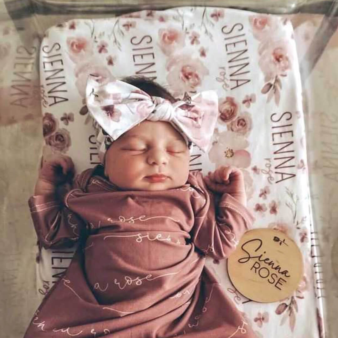 personalized swaddle with roses for baby