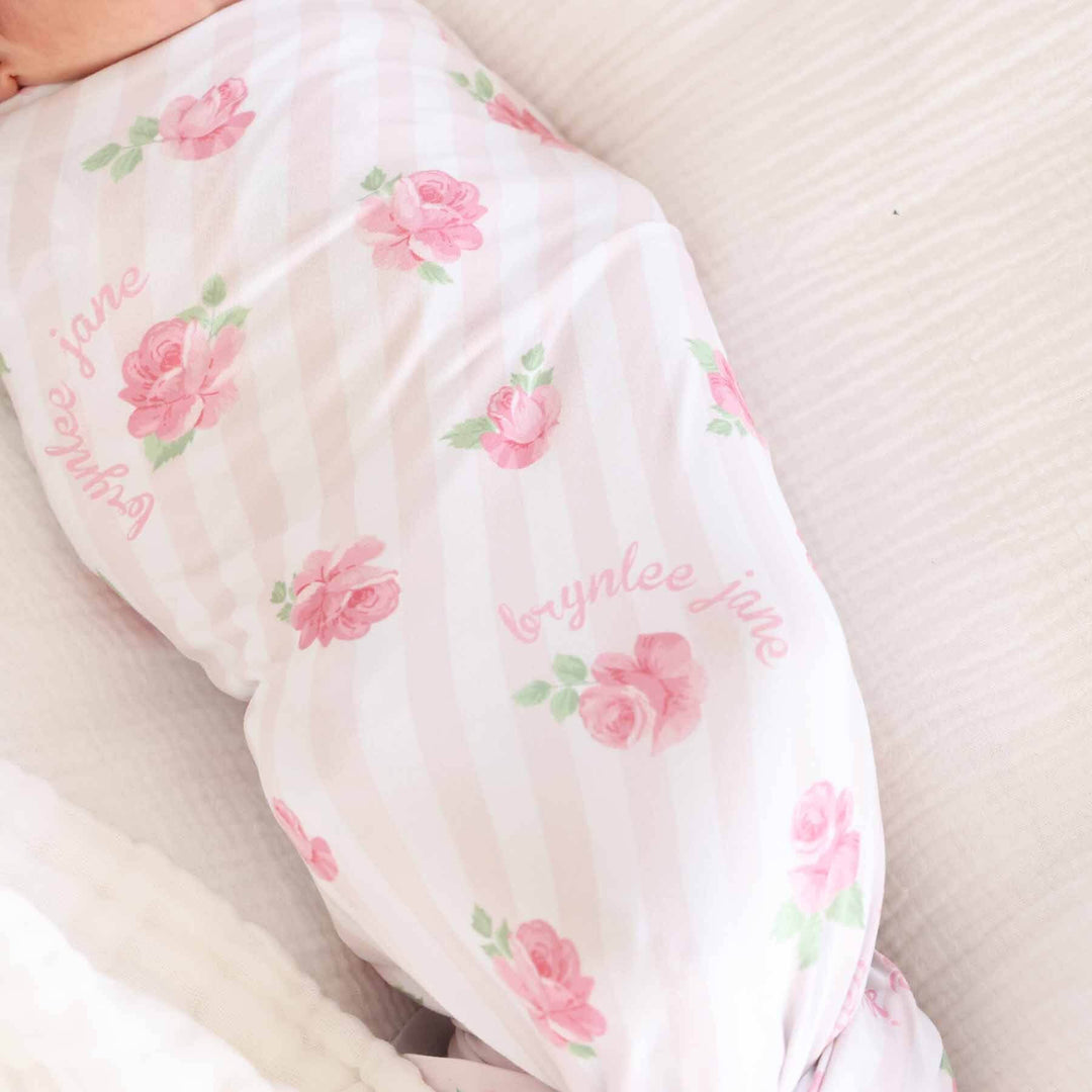 stripe and rose personalized swaddle blanket for girls 