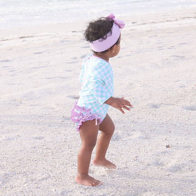 baby swimsuit mint checkered print with purple ruffles 