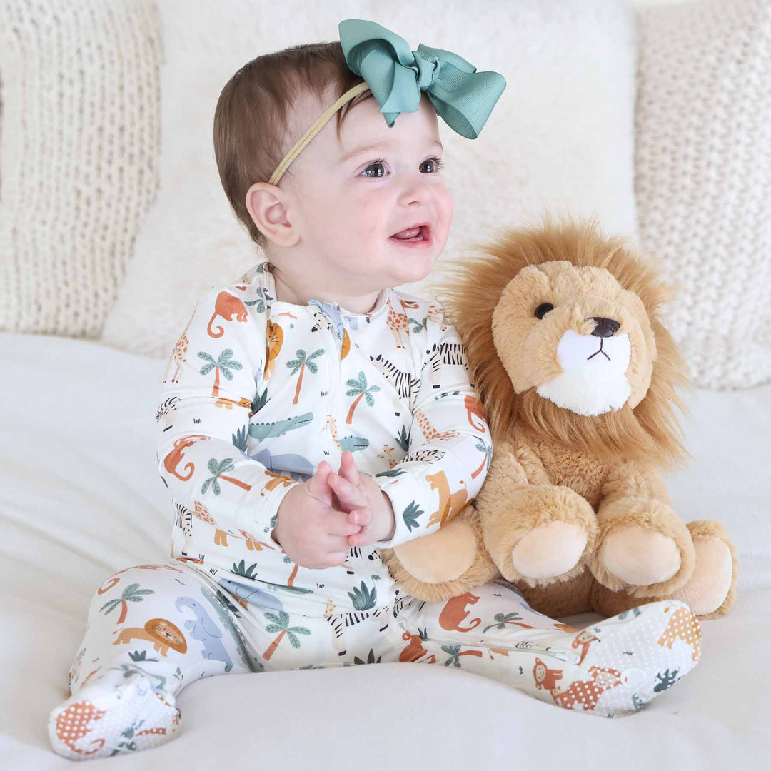 safari snuggles cream, orange and green baby zipper footie 