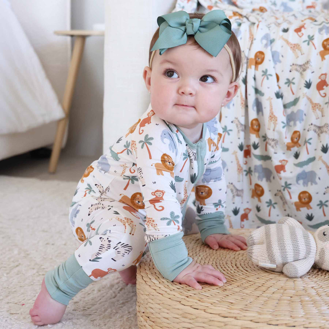 gender neutral convertible zip romper pajama with safari animals and palm trees