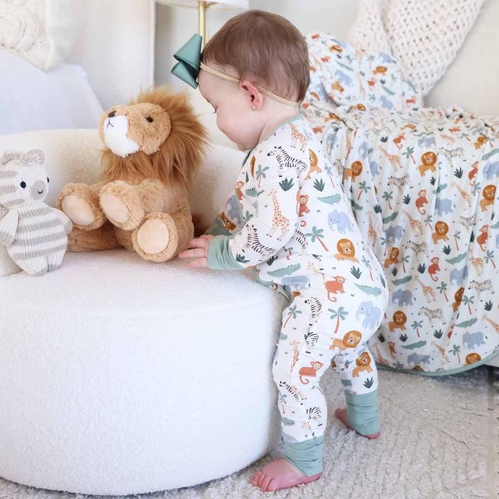 cream, green and orange safari animal convertible zip romper